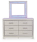 Zyniden King Upholstered Panel Headboard with Mirrored Dresser, Chest and Nightstand