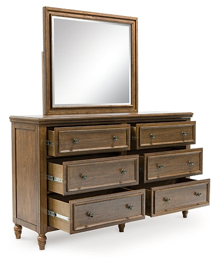 Sturlayne King Upholstered Panel Bed with Mirrored Dresser and Chest